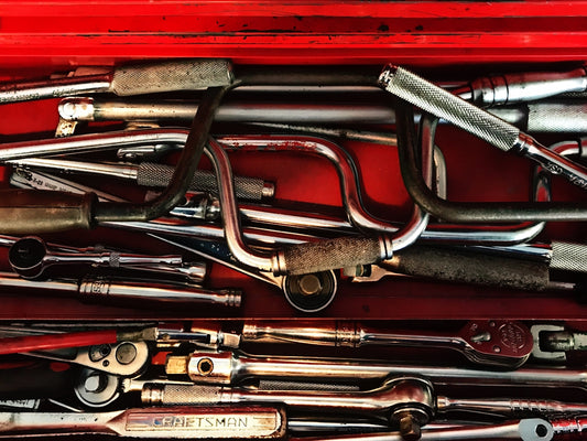 assorted-color hand tools