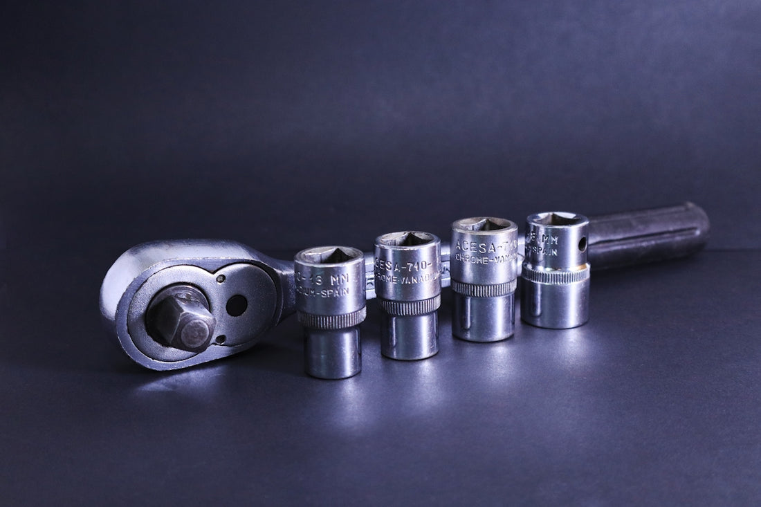A wrench with sockets is shown.