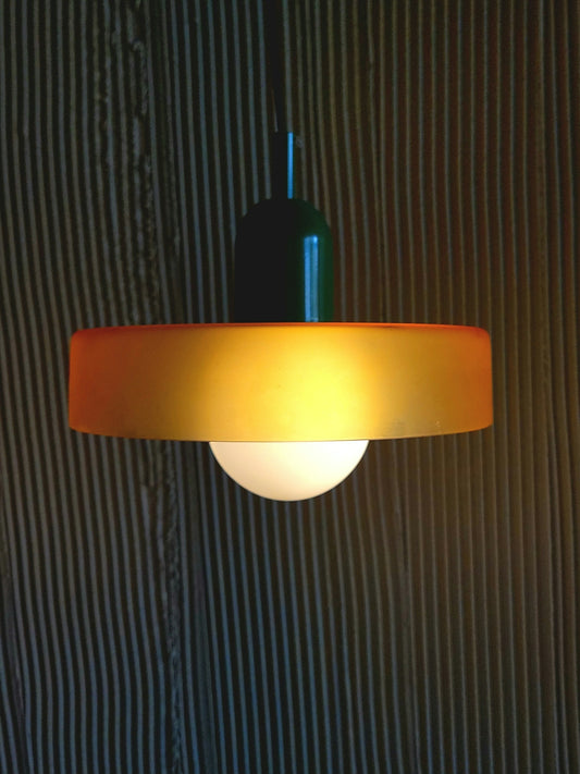 Modern pendant lamp with orange and green accents