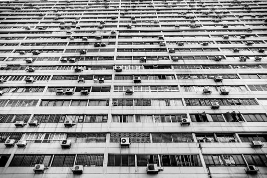 Many air conditioning units on a building facade